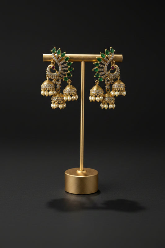 Gold Plated Peacock Triple Jhumka with Emerald & CZ Stones and Pearl Drops