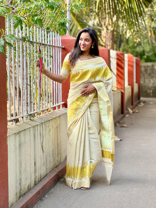 Kerala Tissue saree with sound wave design with stitched blouse.